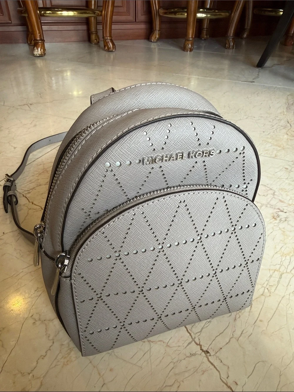 Michael Kors Light Gray Perforated Mini Backpack